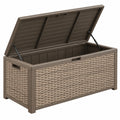 Coffre de rangement extérieur 120 x 56 x 63 cm en plastique brun tressé avec couvercle à vérins - Trandorix